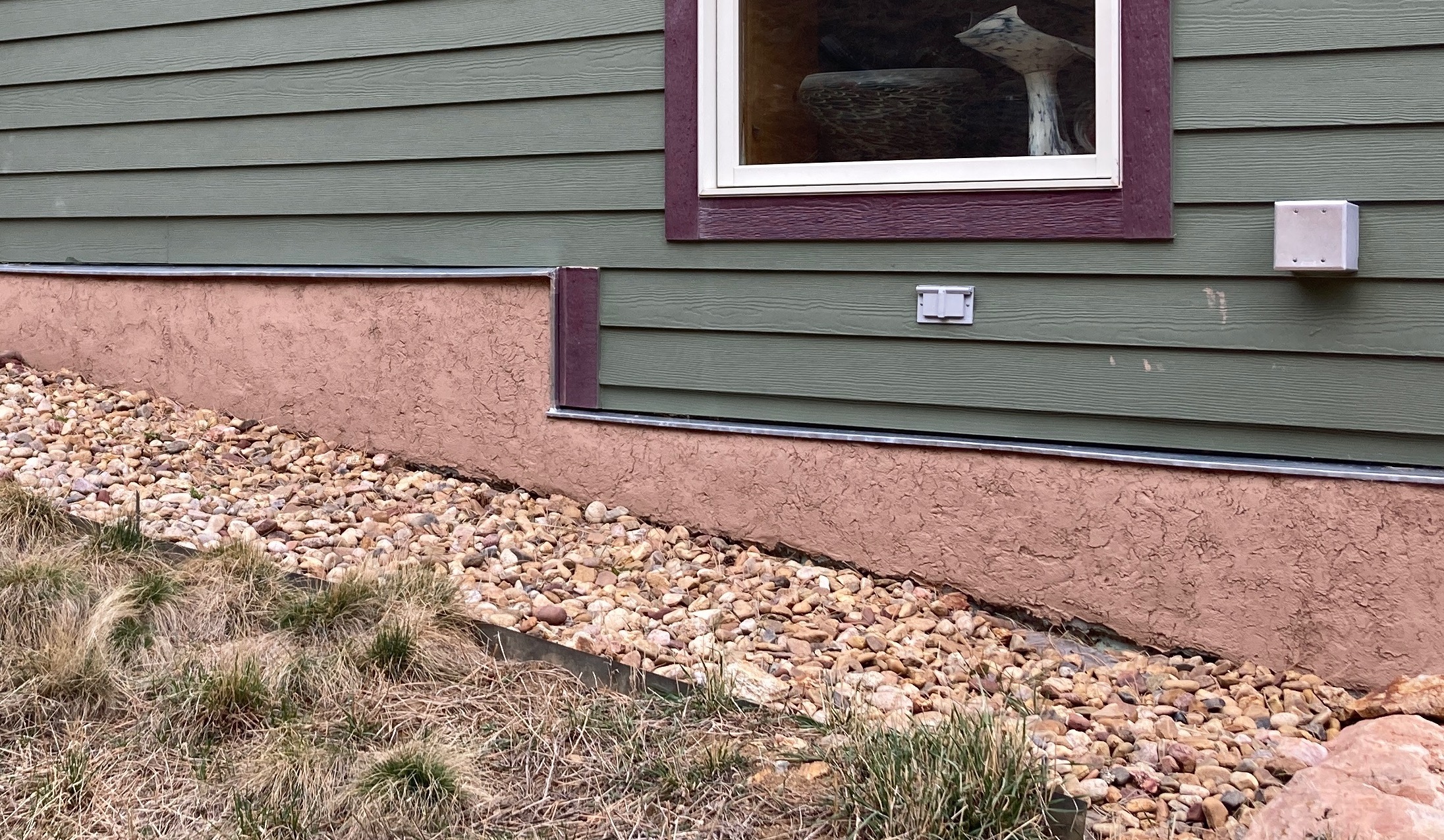 stucco base of wall Stucco base of wall under combustible siding