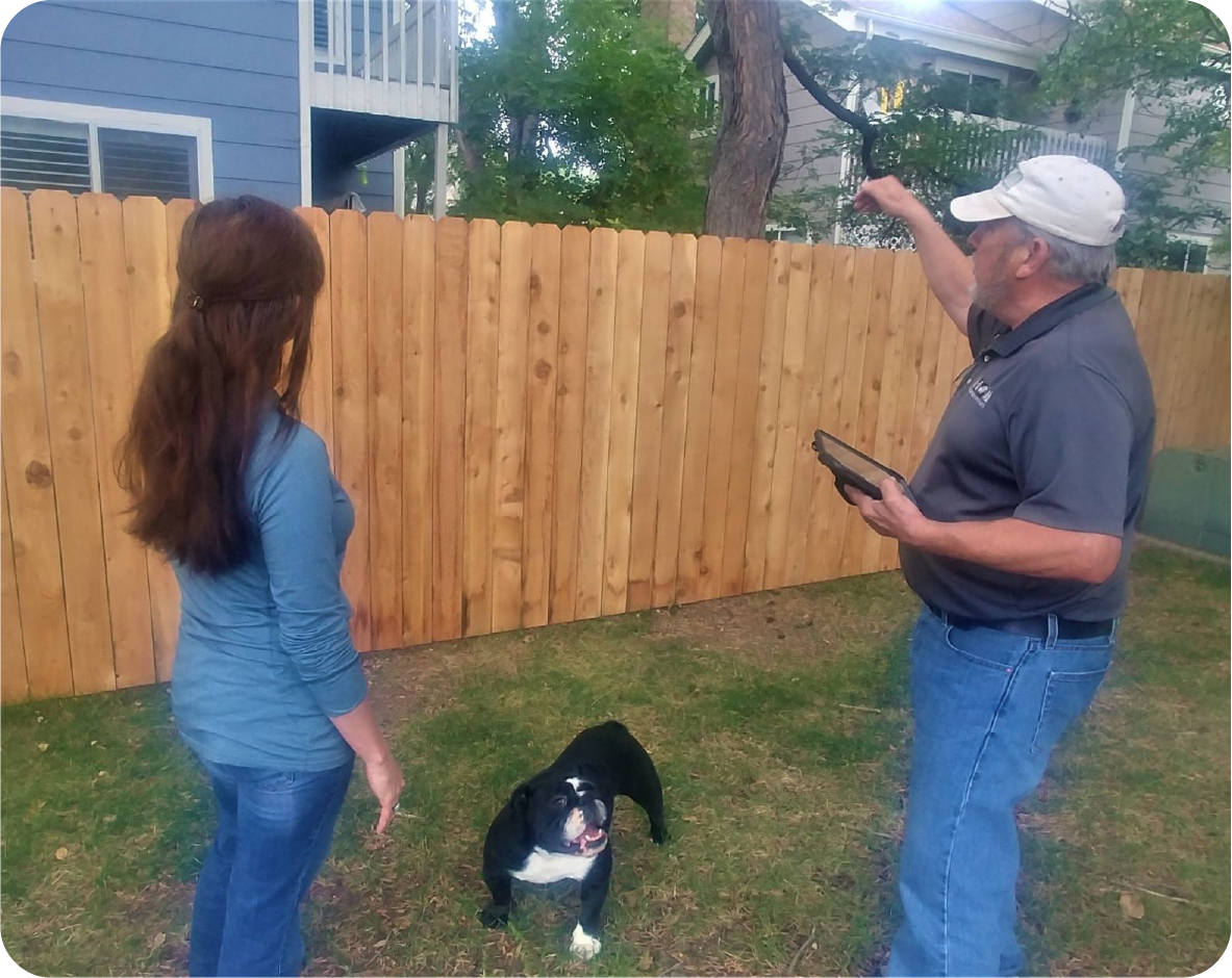 A Wildfire Partners staff assessing a home with a Boulder County resident